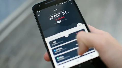 Checking Bitcoin cryptocurrency portfolio list on Delta mobile app 스톡 동영상 93788373