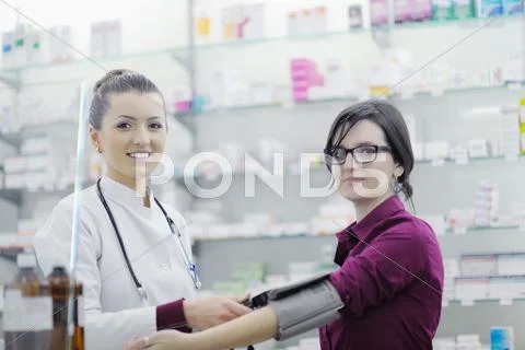 Checking blood pressure and heart rate Stock Photos