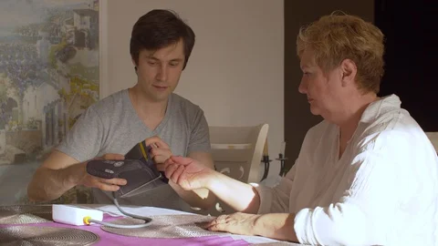 Checking of blood pressure Stock Footage 128697793