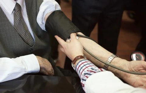 Checking blood pressure Stock Photos