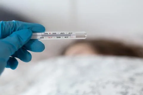 Checking body temperature. Stock Photos