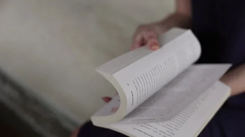 Checking the book, reading, book Stock-Footage 144218127