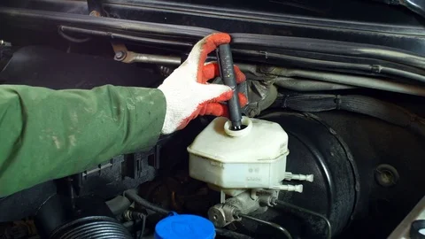 Checking the Brake Fluid Stock Footage 72114331