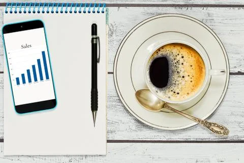 Checking the business report while coffee break Stock Photos