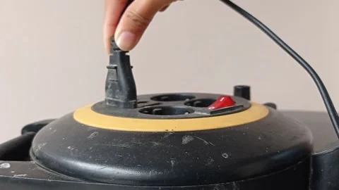 Checking the cable on a black electrical terminal Stock Footage 146247116