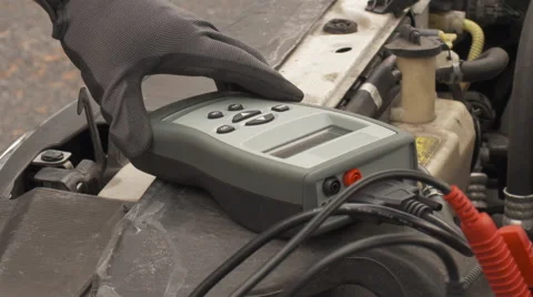 Checking Car Battery Stock Footage 65469059