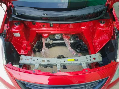 Checking car body work fiber bumper at car garage Stock Photos