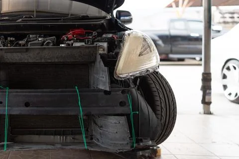 Checking car body work fiber bumper at car garage Stock-Fotos