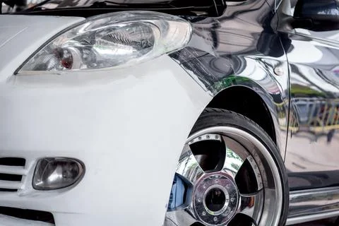 Checking car body work fiber bumper at car garage Foto stock