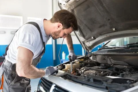 Checking car engine Stock Photos