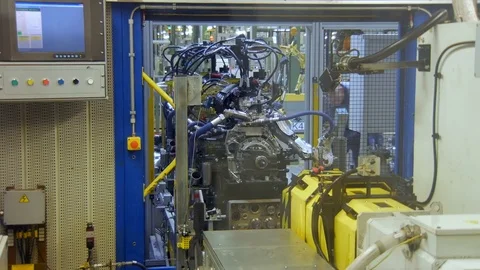 Checking of car engine on production line, at an automobile factory Stock Footage 77628491
