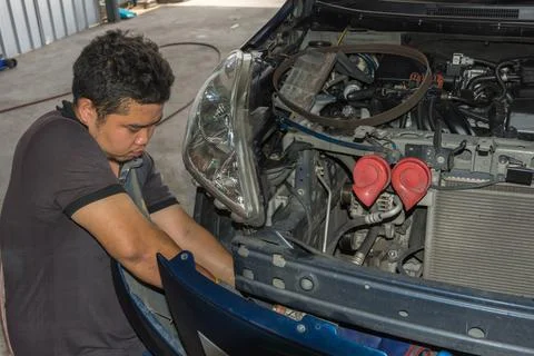 Checking a car at garage Foto stock