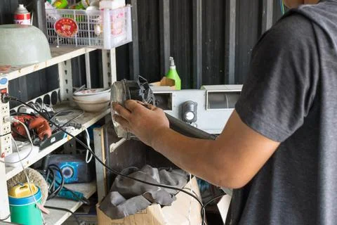 Checking car headlight Stock-Fotos