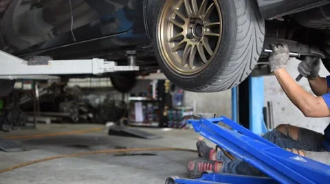 Checking car suspension Stock Footage 62268696