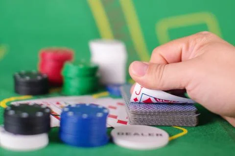 Checking card cheating concept in Poker game Stock Photos