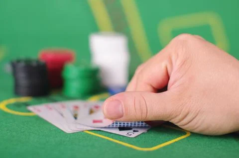 Checking card cheating concept in Poker game Stock Photos