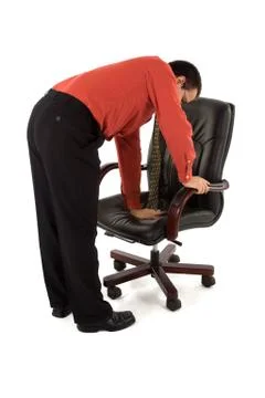 Checking the chair Stock Photos