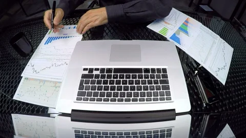  Checking Charts In Office 스톡 동영상 210488114