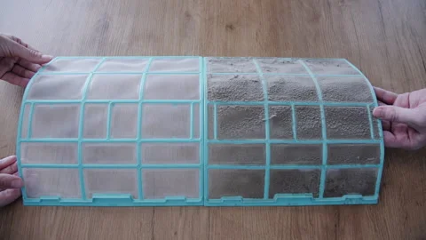 Checking clean and dirty air conditioner filters before cleaning maintenance Vídeo Stock 343959873