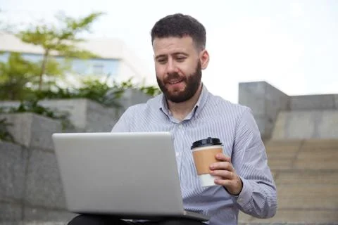 Checking code and drinking coffee Stock Photos