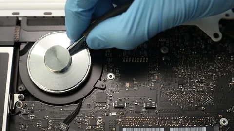 Checking computer mainboard with stethoscope. 스톡 동영상 91794764