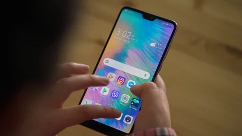 Checking Corona virus updates on a smartphone Video stock 128319005
