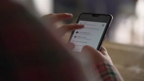 Checking Corona virus updates on a smartphone Video stock 128319230