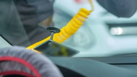 Checking the crack with a special device on the front window of the car Vídeos de archivo 87738606