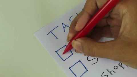 Checking Off Daily Tasks on Paper Stockbeeldmateriaal 345712481