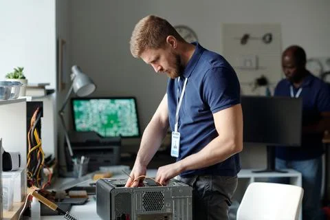 Checking details of computer processor 스톡 사진