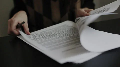 Checking the document Stock-Footage 144211829