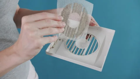Checking Dust Accumulation and Clogged Ventilation Filter Before Home Cleaning Stock Footage 341397294
