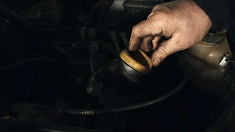 Checking Engine Oil in Car Engine Stock Footage 330693448