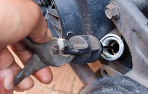Checking the engine oil level and condition Stock Photos