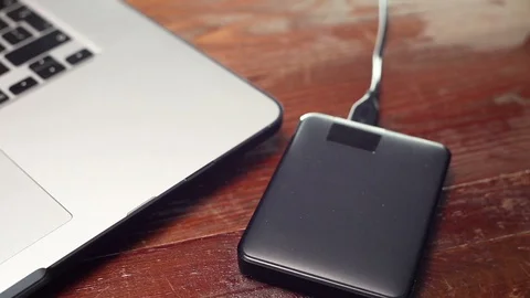 Checking external hard disk with stethoscope. Stock Footage 91832670