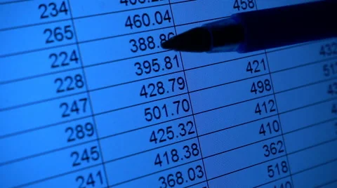 Checking figures on spreadsheet, blue toned Stock Footage 61690557
