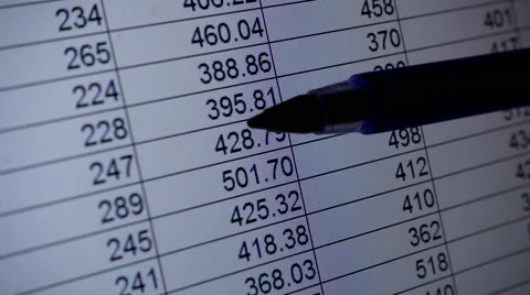 Checking figures on spreadsheet Stock Footage 61299399