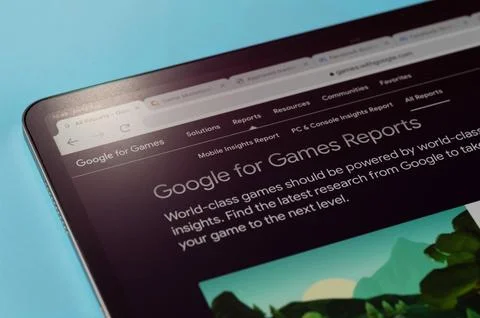 Checking Google for games ad report Stock Photos