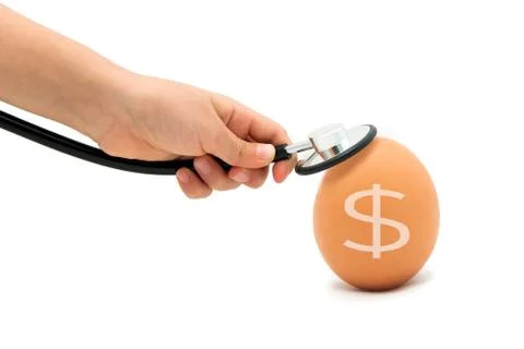 Checking For A Healthy Egg, Egg with Stethoscope with white background Stock Photos
