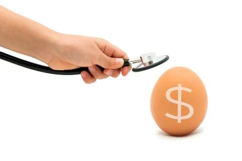 Checking For A Healthy Egg, Egg with Stethoscope with white background Stock Photos