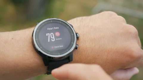 Checking the heart rate by smart watch. Smartwatch. Touching screen. Pulse ch Видео 100988251