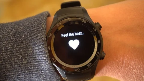 Checking Hearth Rate wirh a Smartwatch, Close Up Stock Footage 103861017