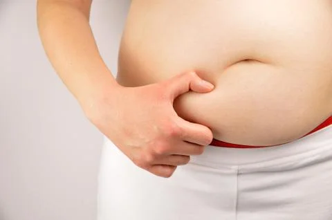 Checking her fats 库存照片