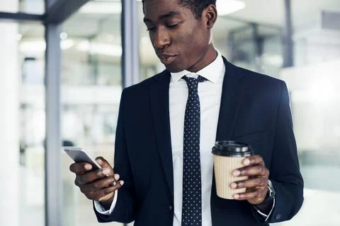 Checking up on his updates Stock Photos
