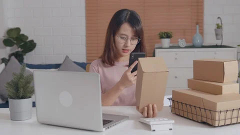 Checking information by using smartphone scan QR code on box Video stock 128188821