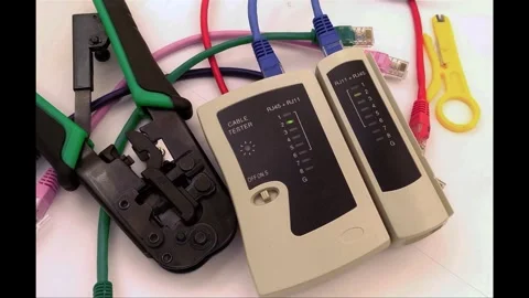 Checking the integrity of computer wires with a tester Stock Footage 297203197