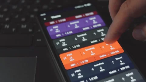 Checking the internet speed on mobile ph... | Stock Video | Pond5