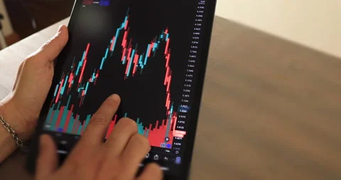 Checking investments on the tablet, close-up 4k video Stock Footage 169927373
