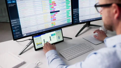 Checking KPI Dashboard While Making Business Report Stock Footage 328391250