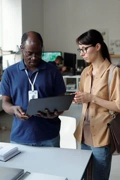 Checking laptop and identifying problem Stock Photos